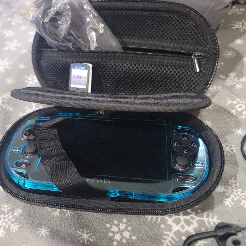 Ps vita with case and 2 games